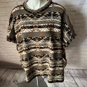 Kaos poncho with fringed sleeves